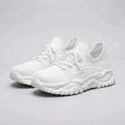 White sneakers on a gray background