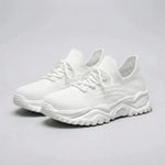 White sneakers on a gray background