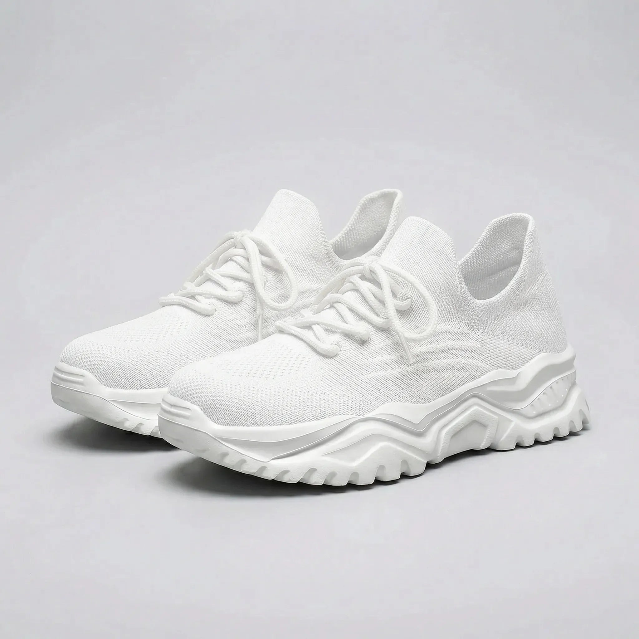 White sneakers on a gray background