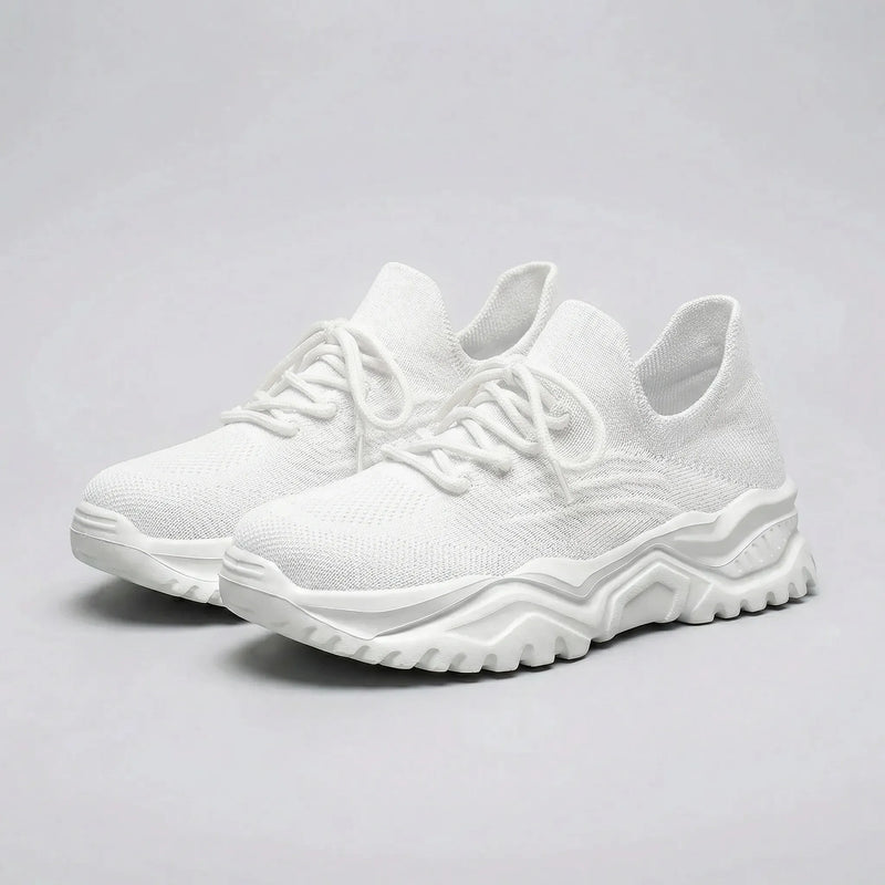 White sneakers on a gray background