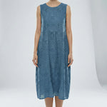 Blue sleeveless dress with floral patterns on a white background