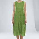 Green dress with floral patterns on a white background3