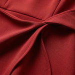 Close-up of a red fabric with a knot2