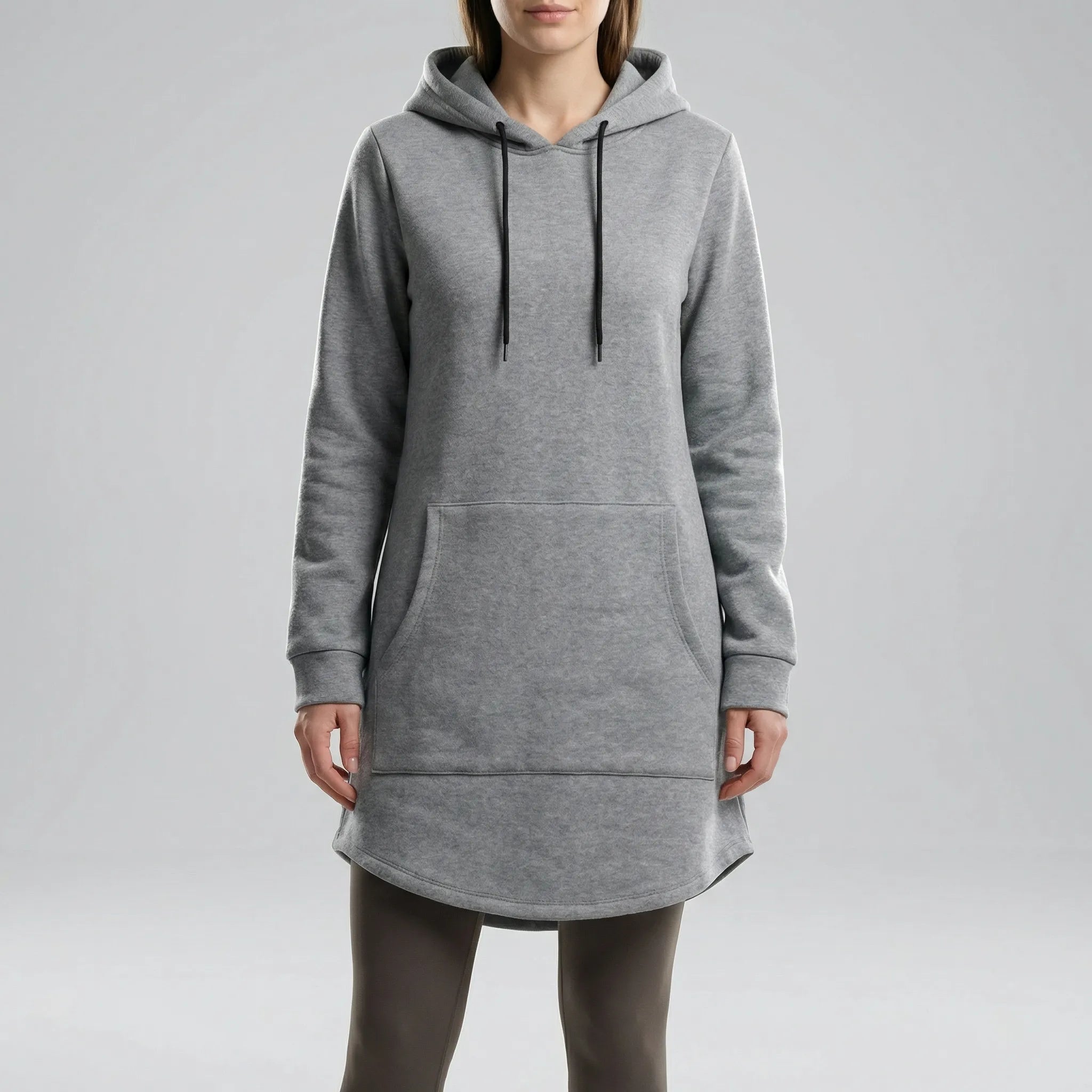 Person wearing a gray hoodie dress on a plain background1