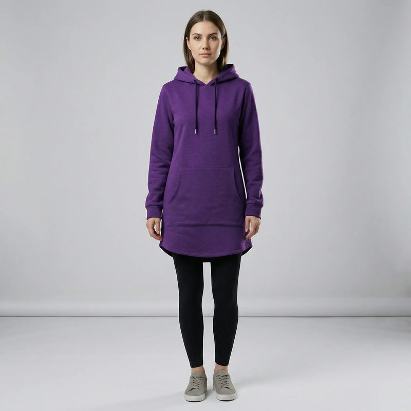 Person wearing a purple hoodie and black leggings on a gray background