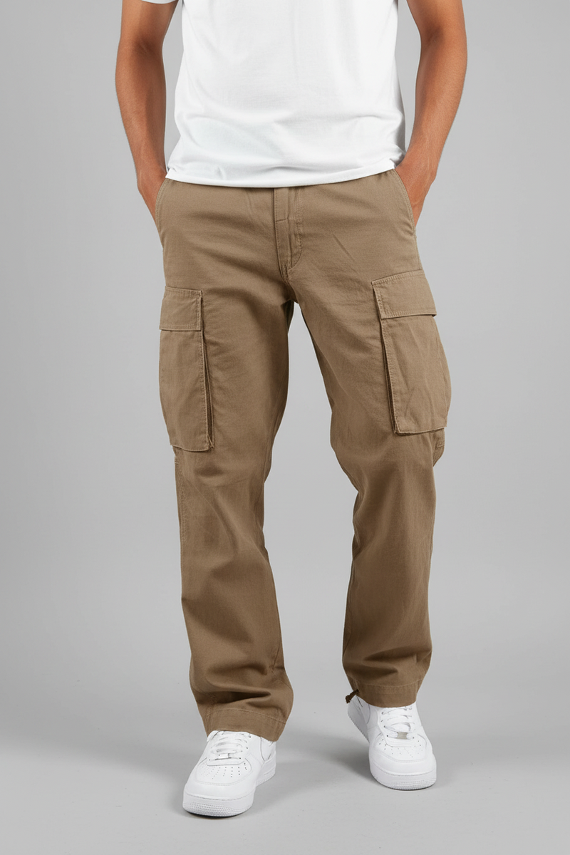 Beige cargo pants worn by a person on a white background