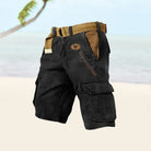 Black cargo shorts with a brown belt and 'Yellowstone' logo on a light background