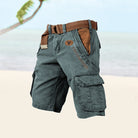 Green cargo shorts with a brown belt on a light background