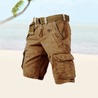 Brown cargo shorts with a belt on a light background