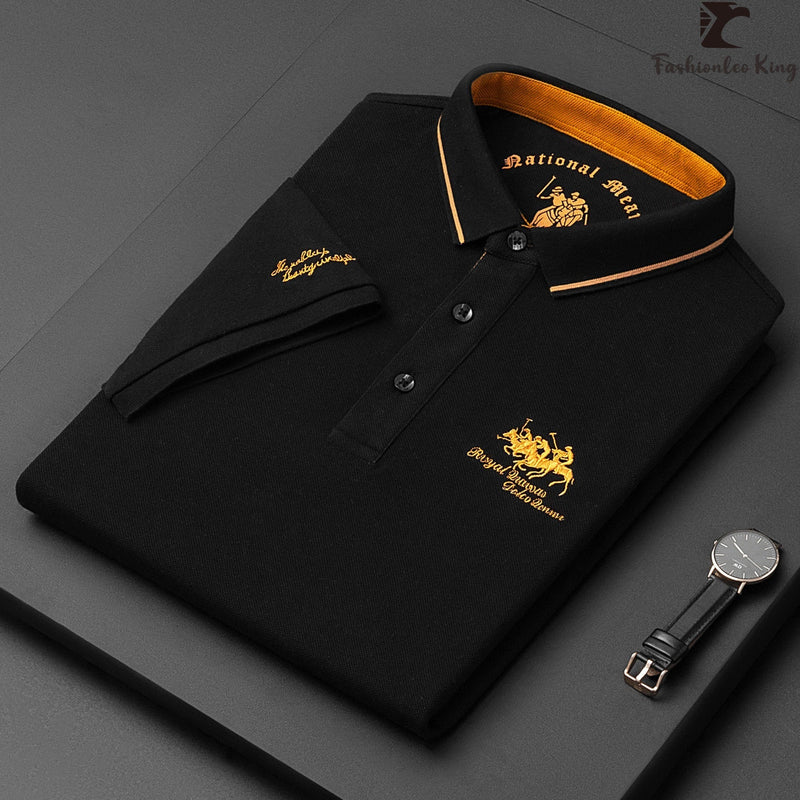 Black polo shirt with gold embroidery on a dark gray background