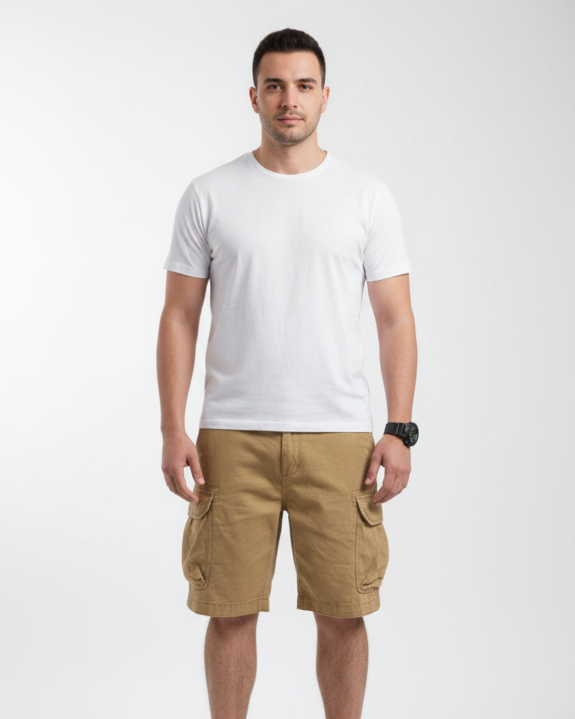 Person wearing beige cargo shorts with a blurred background