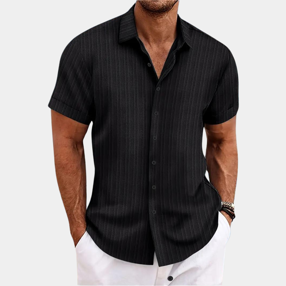 Man wearing a black pinstripe short-sleeve shirt on a white background