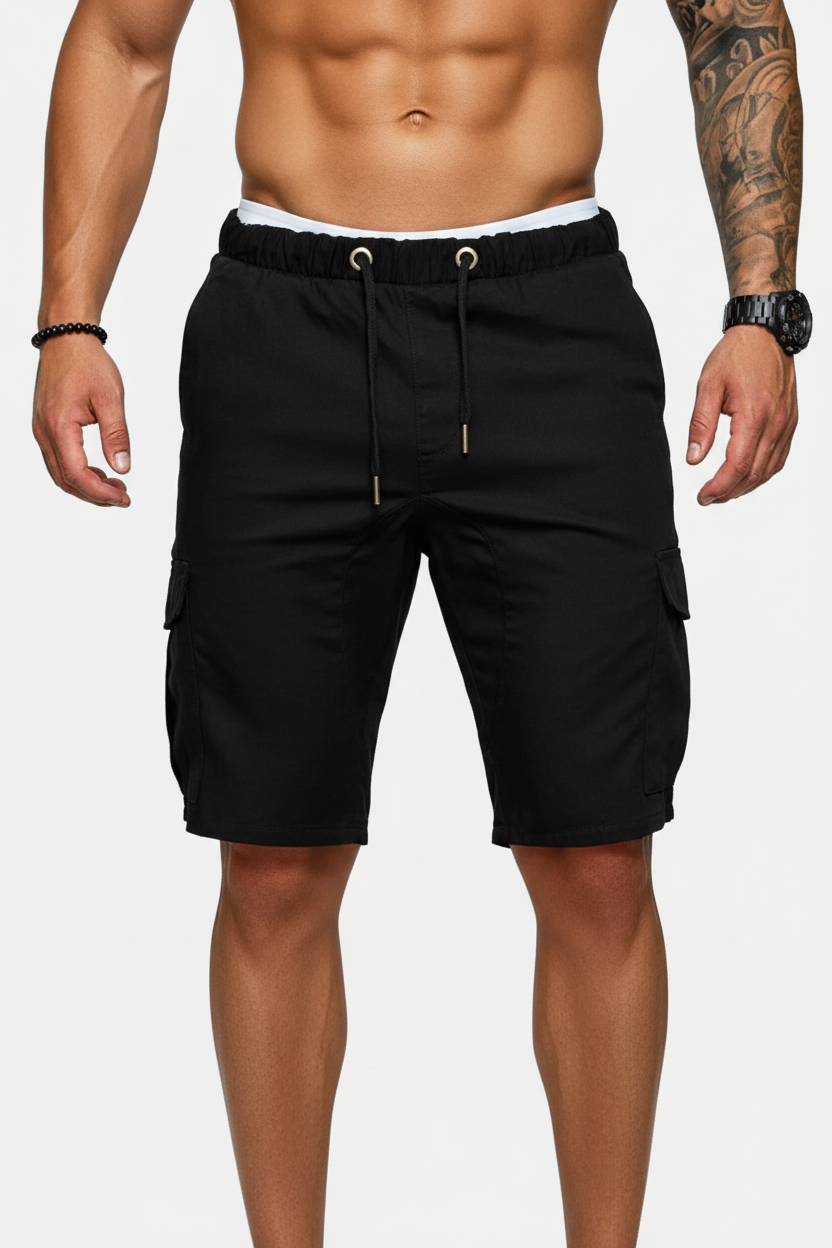 Black cargo shorts worn by a person on a white background