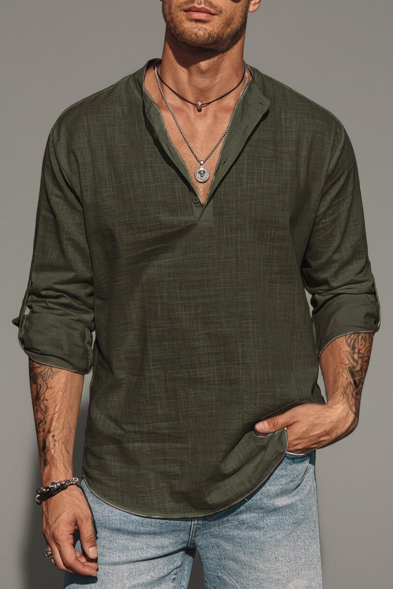 Man wearing a green shirt with 'Animal Game' branding on a white background