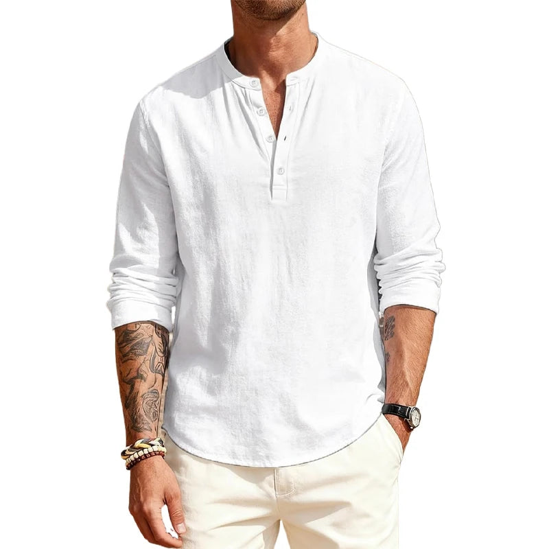 Man wearing a white long-sleeve shirt with rolled-up sleeves on a white background