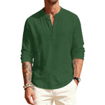 Man wearing a green long-sleeve shirt with a brand logo on a white background