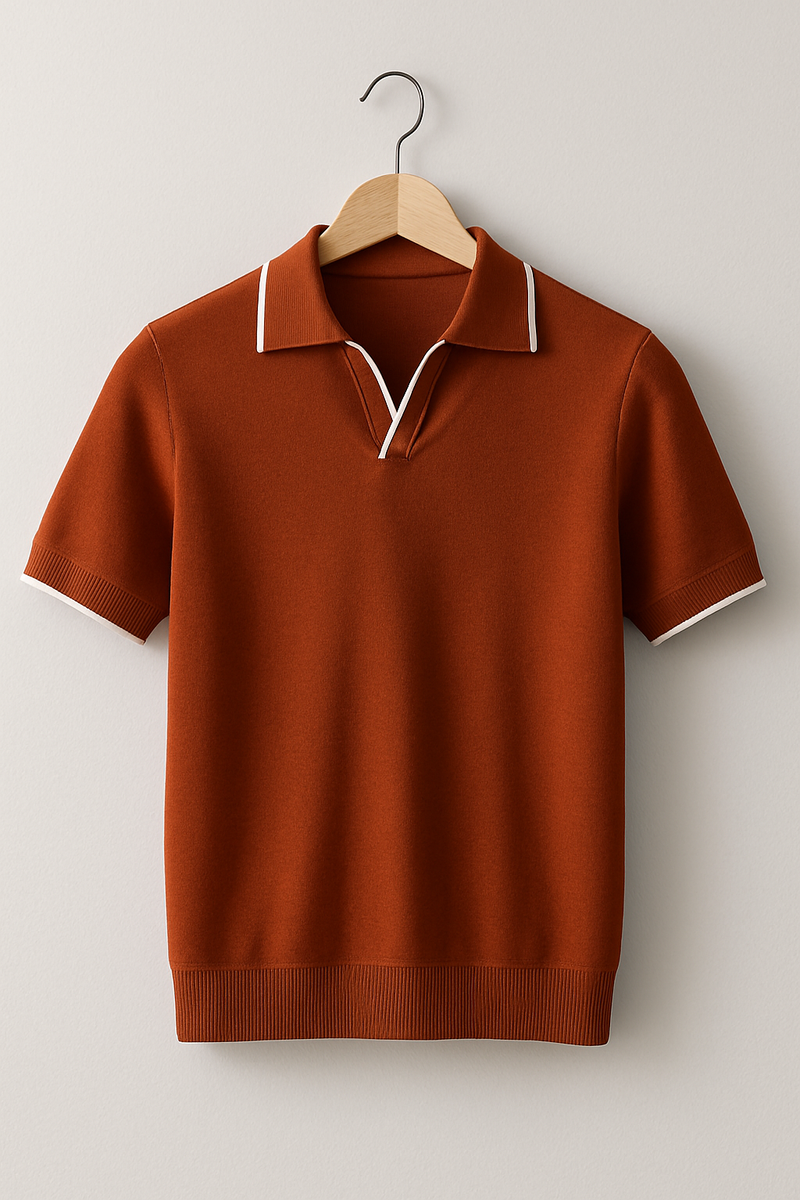Brown short-sleeve sweater with white collar on a wooden hanger against a light gray background