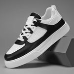 Black and white sneaker on a gray background