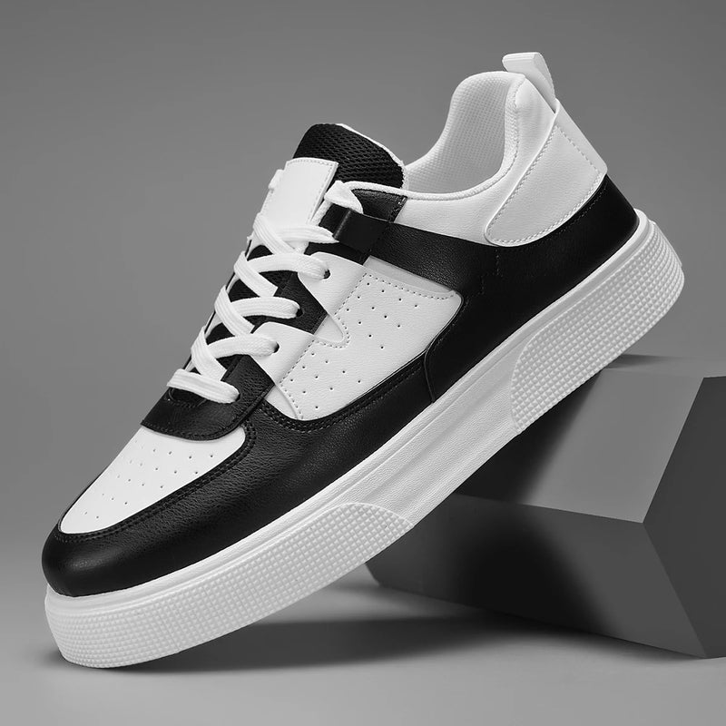 Black and white sneaker on a gray background