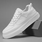 White sneaker on a gray background