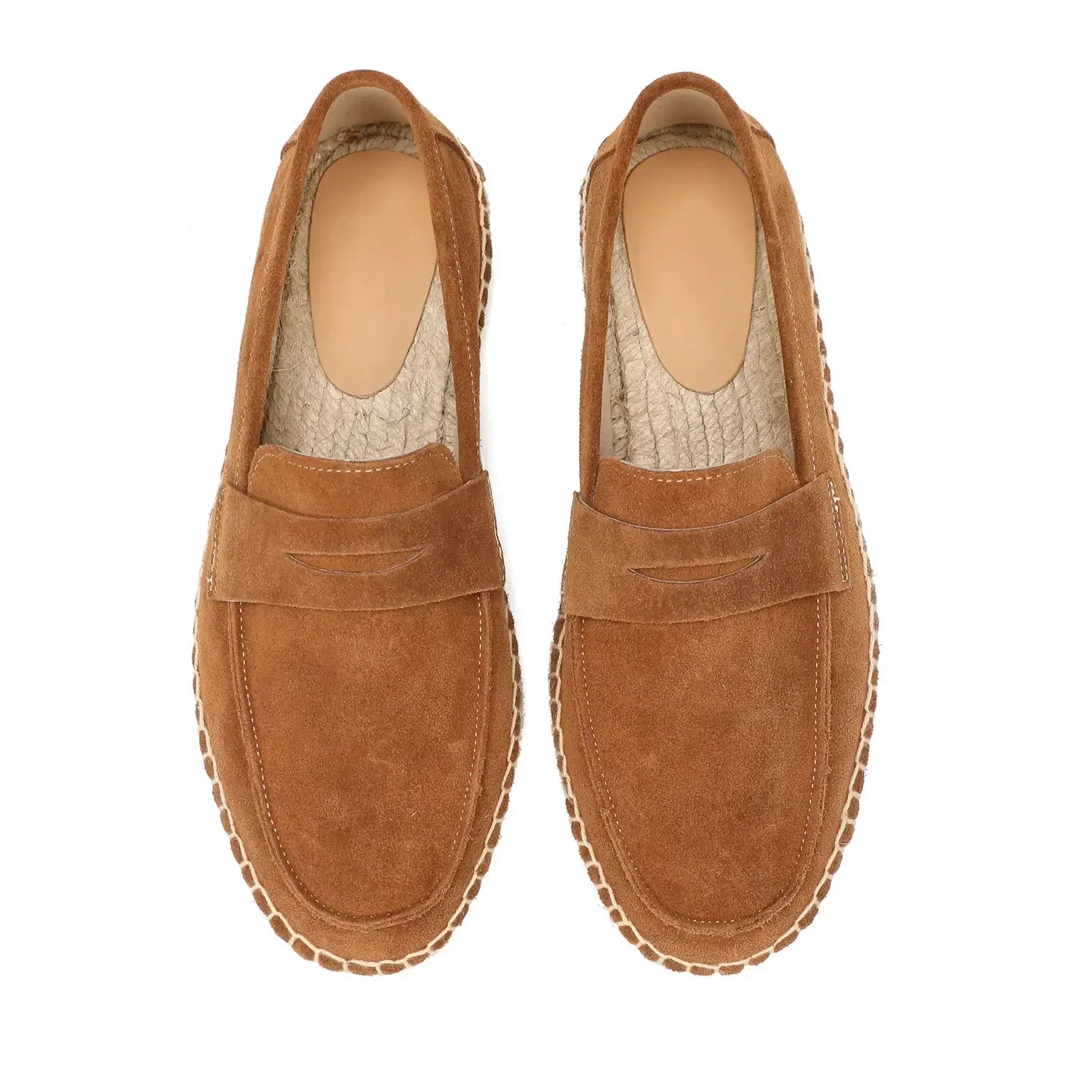 Pair of brown loafers on a white background