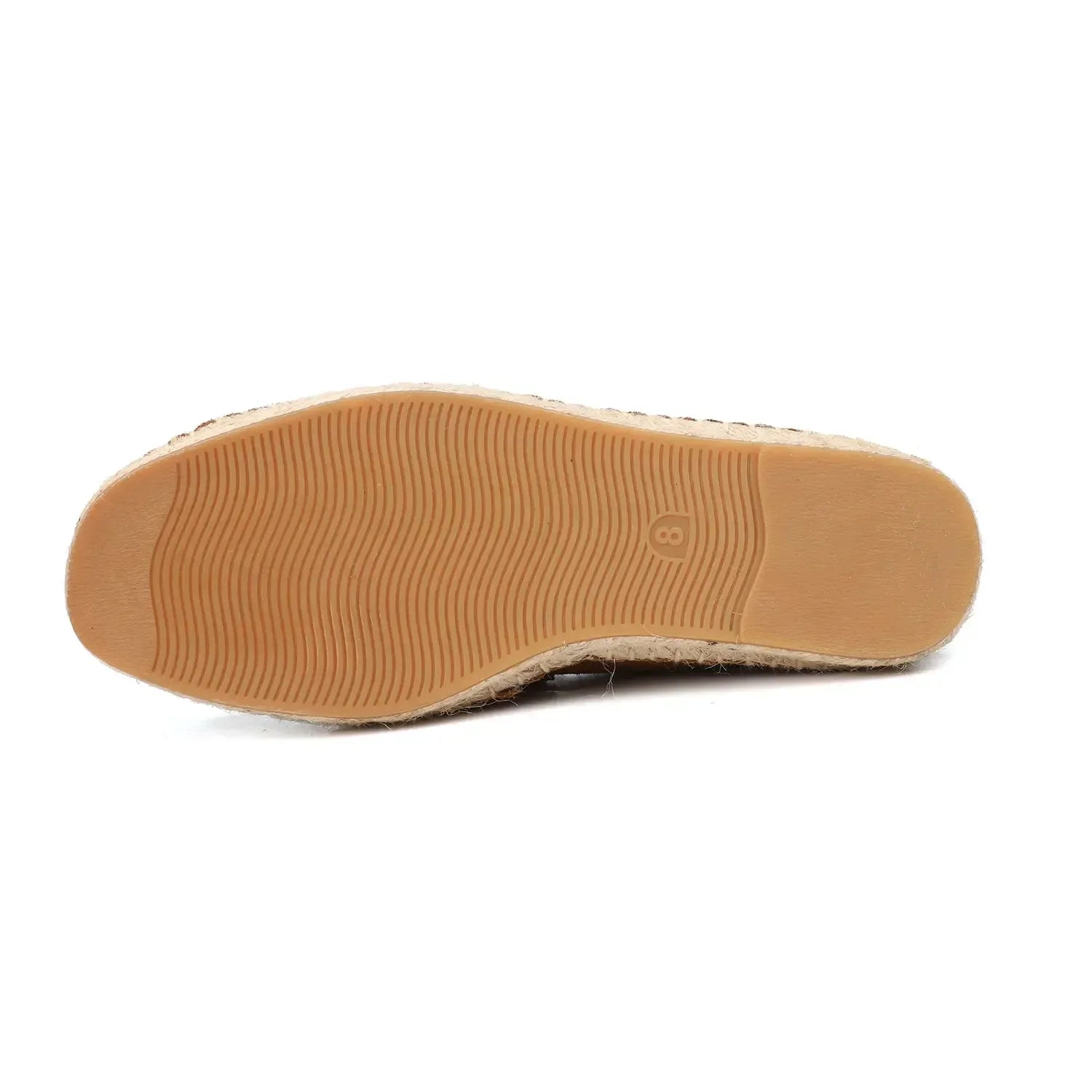 Tan shoe sole on a white background