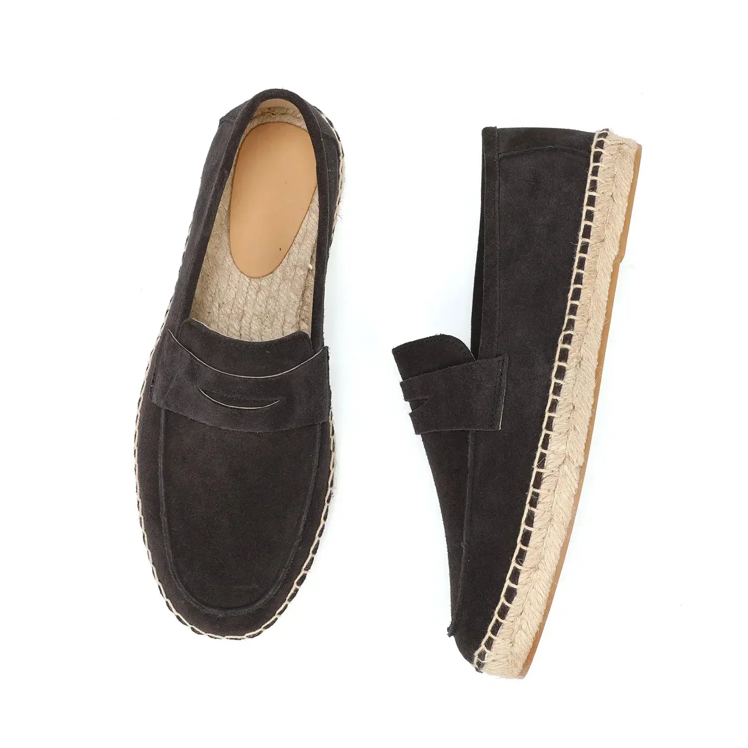 Black suede espadrille loafers on a white background