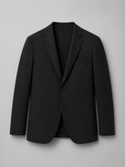 Black blazer on a light gray background