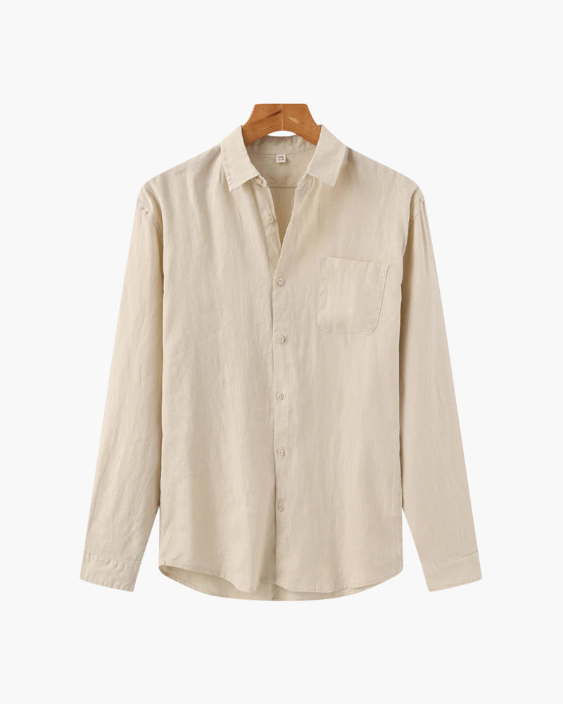 Beige shirt on a hanger against a white background