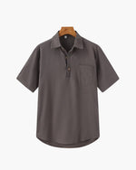 Gray short-sleeve shirt on a hanger with a white background