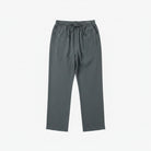 Gray pants on a hanger against a white background