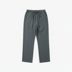 Gray pants on a hanger against a white background