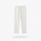 White pants on a hanger against a white background