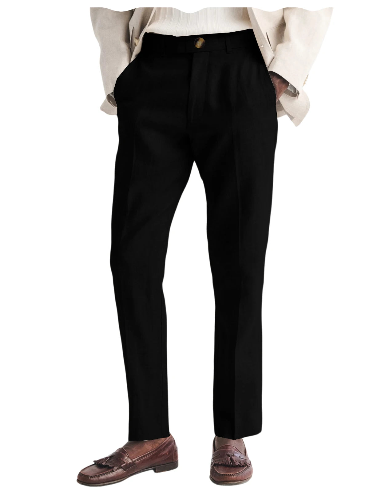Black dress pants worn with a beige blazer and brown shoes on a white background