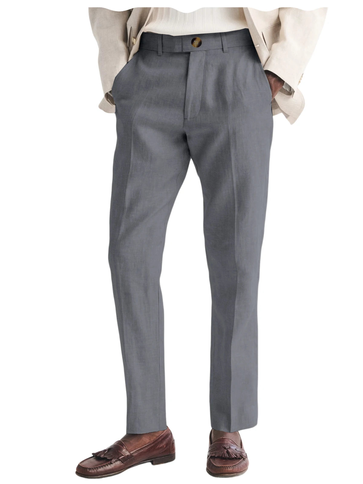 Gray dress pants worn with a beige blazer and brown shoes on a white background