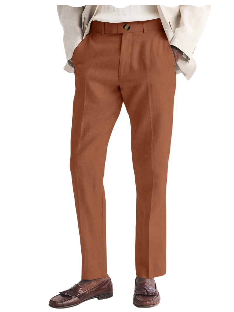 Brown dress pants worn with a white shirt and brown shoes on a white background