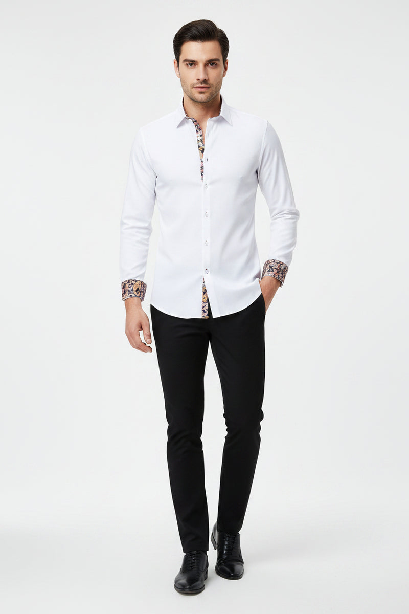 White dress shirt with patterned cuffs and collar on a white background