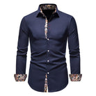 Navy blue shirt with patterned collar and cuffs on a white background
