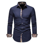 Navy blue shirt with patterned collar and cuffs on a white background