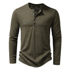 Green long-sleeve shirt with button details on a white background