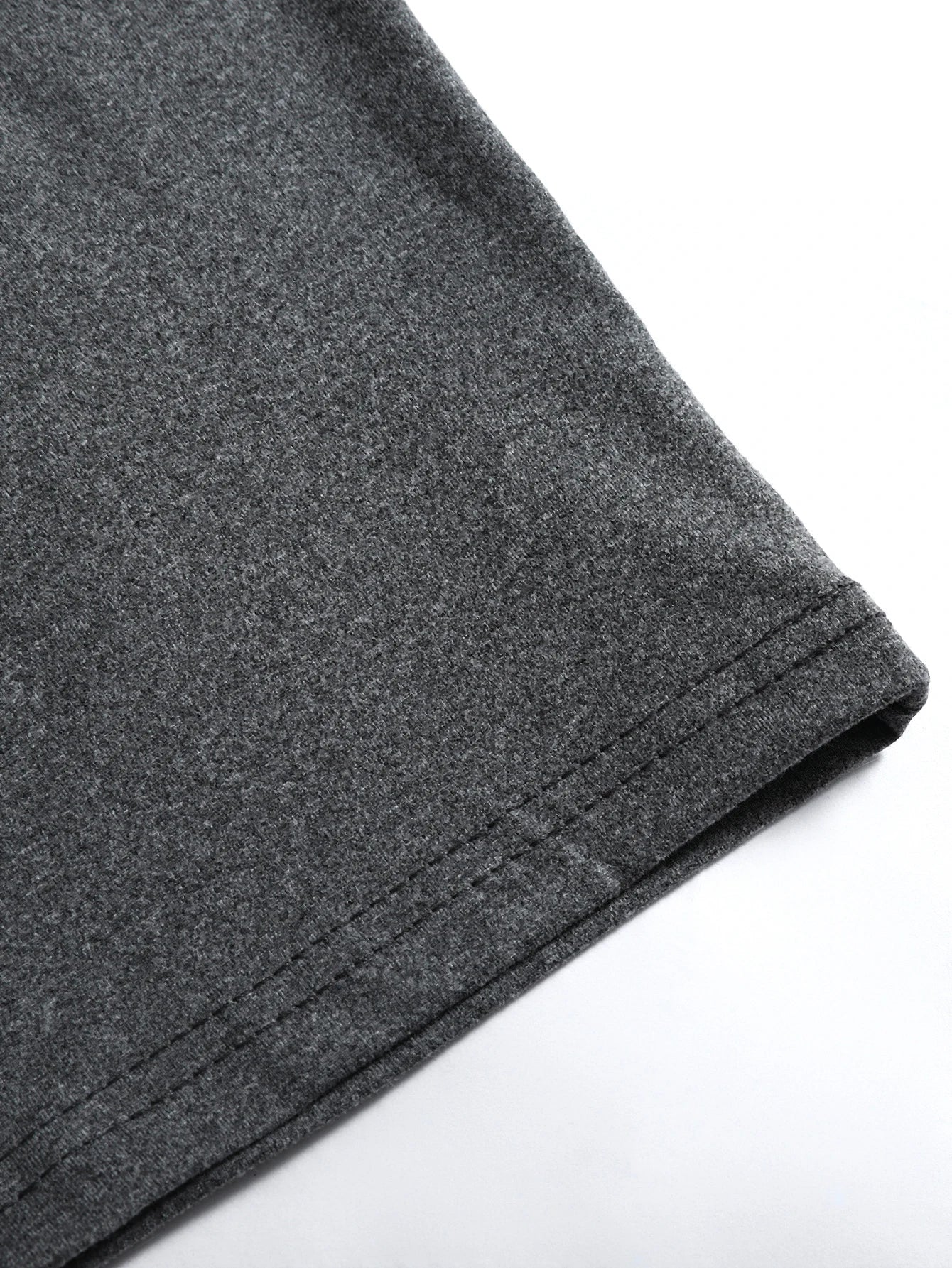 Close-up of gray shorts on a white background