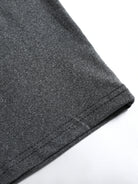 Close-up of gray shorts on a white background