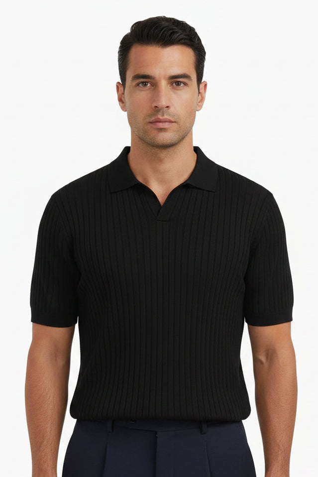 Person wearing a black short-sleeve shirt and dark pants on a white background