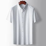 White short-sleeve shirt on a wooden hanger against a gray background