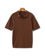 Brown ribbed polo shirt on a hanger against a white background
