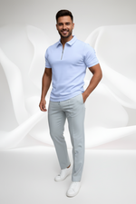 Light blue polo shirt with a zipper on a white background