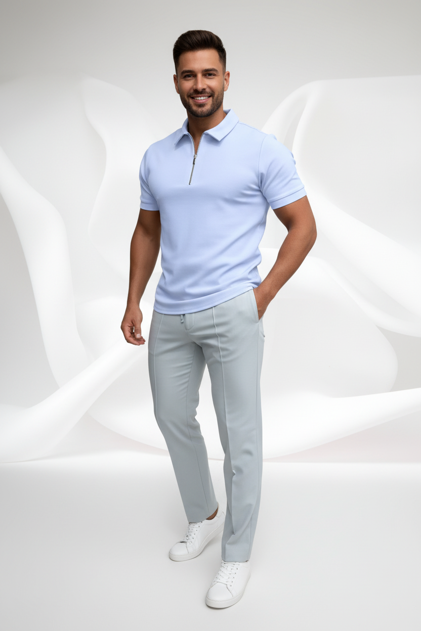 Light blue polo shirt with a zipper on a white background