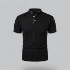Black polo shirt with white buttons on a gray background