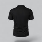 Black polo shirt on a gray background