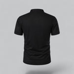 Black polo shirt on a gray background